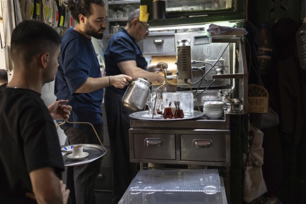 Istanbul, Turkey. June 23rd 2025. A small tea shop preparing tea and coffee to be delivered to market traders and customers in the Grand Bazaar, one of the largest and oldest covered markets in the world, Istanbul Turkey