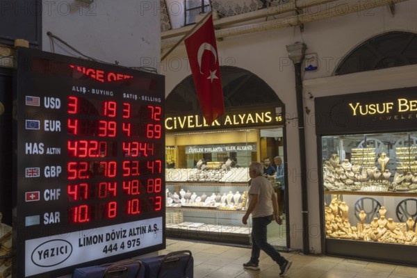 Istanbul, Turkey. June 23rd 2025. Gold shops and currency exchange offices in the Grand Bazaar, one of the largest and oldest covered markets in the world, Istanbul Turkey