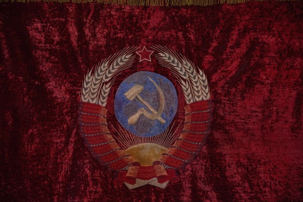Gori, Georgia. September 9th 2025. A soviet hammer and sickle design insignia, historical memorabilia part of an exhibition of the life and career of Joseph Stalin at the Stalin Museum, Gori, Georgia
