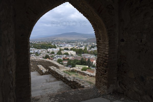 Gori, Georgia. September 9th 2025. View of Gori city from the entrance of Gori Fortress, a medieval citadel in Georgia, situated above the city of Gori on a rocky hill