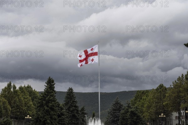 The Georgian flag flying in Stalin Park near the Stain Museum on Stalin Avenue, Gori, Georgia