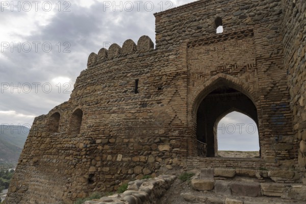 Gori, Georgia. September 9th 2025. The battlements and entrance to Gori Fortress, a medieval citadel in Georgia, situated above the city of Gori on a rocky hill