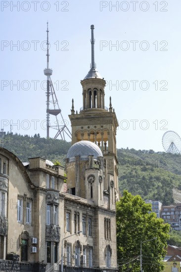 Tbilisi, Georgia. July 11th 2025. View from Tbilisi's Rose Revolution square of the Georgian National Academy of Sciences and Tbilisi's TV Tower sitting atop Mtatsminda hill, Tbilisi, Georgia
