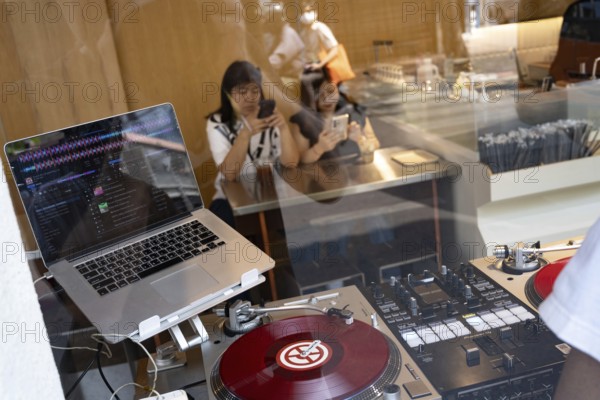Bangkok, Thailand. March 25th 2025. A DJ deck set up inside a popular café in the trendy Talat Noi district near Chinatown in the Thai Capital, Bangkok, Thailand