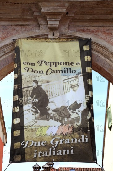 Italy, village of Brescello, advertisement for Museum of Don Camillo and Peppone, Emilia-Romagna