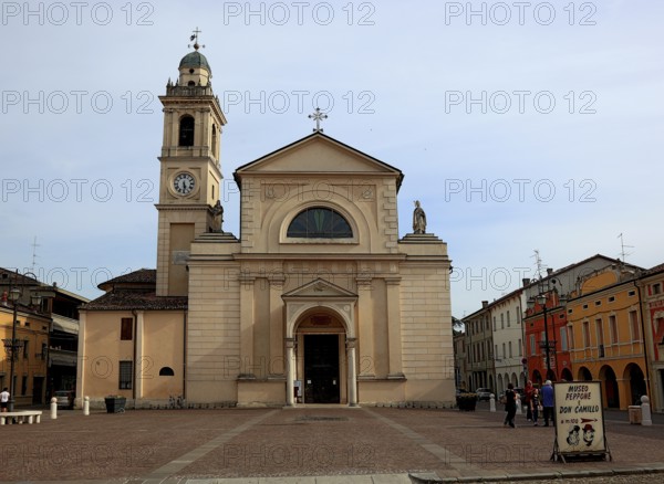 Brescello, note about the Don Camillo and Peppone museum in front of the church of Santa Maria Nascente e San Genesio, a filming location for the films, Emilia-Romagna, Italy