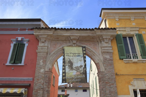 Italy, village of Brescello, advertisement for Museum of Don Camillo and Peppone, Emilia-Romagna