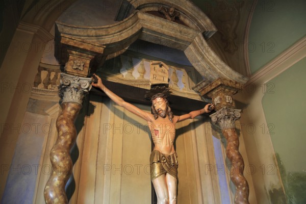 Italy, village of Brescello, cross from the movie, Don Camillo and Peppone in the church of Brescello