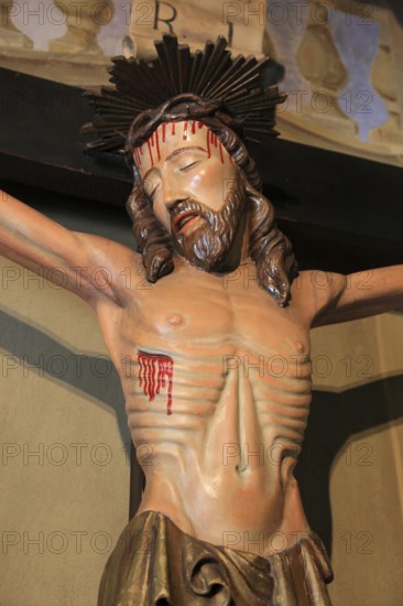 Italy, village of Brescello, cross from the movie, Don Camillo and Peppone in the church of Brescello