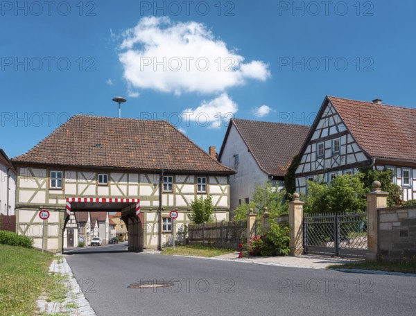 The gatehouse of Trappstadt, town hall, half-timbered house from 1728 with passage, Trappstadt, Lower Franconia, Bavaria, Germany