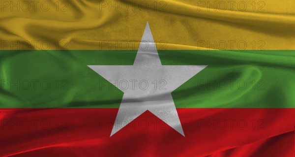 Flag of Myanmar with fabric textured background. Close up of National flag of Myanmar with realistic texture