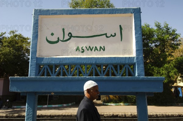 Aswan, Egypt. January 7th 2013 Sign for the city of Aswan on the platform of Aswan train station in upper Egypt
