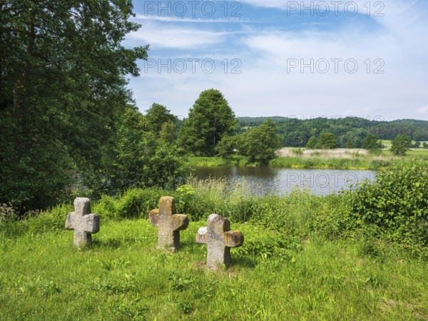 Group of three medieval stone crosses on the banks of the river Naab, Sühnekreuz, Mordkreuz, near Nabburg, Upper Palatinate, Bavaria, Germany
