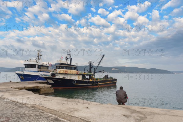 Canakkale, Turkey. February 18th 2022 Turkish fishing boats moored in Canakkale on the Dardenelles near Gallipoli, the western coast of Turkey