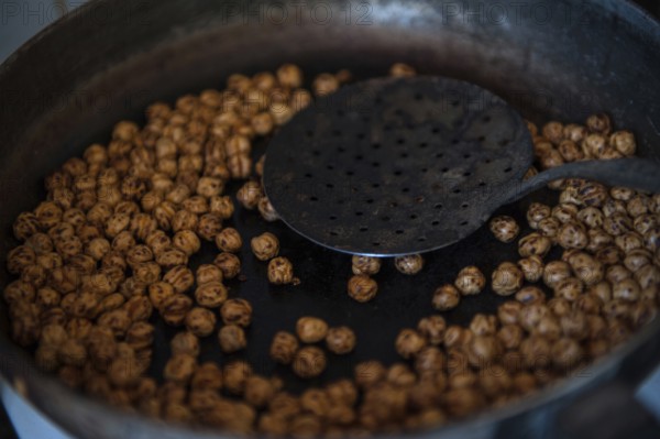 Ortahisar, Cappadocia, Turkey. September 19th 2018 Chickpeas roasting Boza is a traditional Turkish fermented malt drink made from bulgar, rice, yeast and chick peas with cinamon
