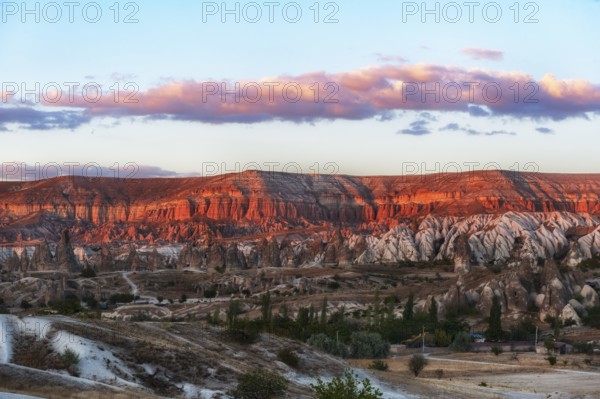 Beautiful sunset panorama of the Red Rose Valley in Cappadocia, a perfect location for hiking or horse riding and the one the most Instagramable spots near Goreme in Central Anatolia, Turkey