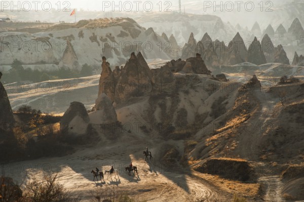 Cappadocia, Turkey. November 8th 2017 Riders pass through the volcanic landscape of Anatolian Cappadocia, known as the Land of Beautiful Horses