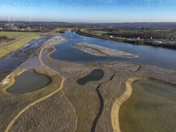 Haltern-Marl, North Rhine-Westphalia, Germany - Lippe, flood protection in the Haltern-Lippramsdorf-Marl area (HaLiMa) . Flood protection on the River Lippe by relocating the dyke and thus extending the floodplain. On the left, the completed floodplain north, the north dyke. Work is still in progress on the south dyke. At the back left, the headframe of the former shaft 8 of Auguste Victoria colliery