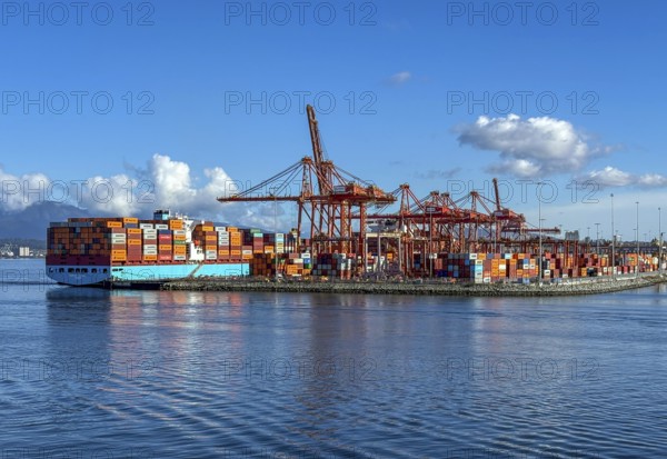 Vancouver, British Columbia, Canada - The Port of Vancouver, Port of Vancouver, is Canada's largest seaport and one of the most important ports in North America, particularly on the west coast of the Pacific Ocean. Container ships are unloaded at the Centerm container terminal, Centerm is the abbreviation for Centennial Terminals