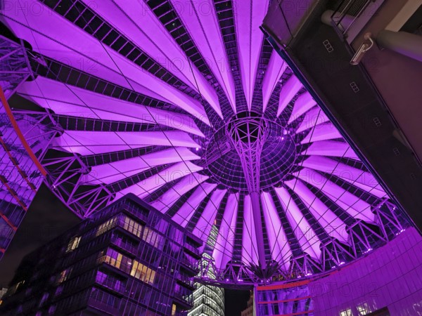Illuminated roof of the Center am Potsdamer Platz in Berlin in bright pink, with futuristic design, Berlin