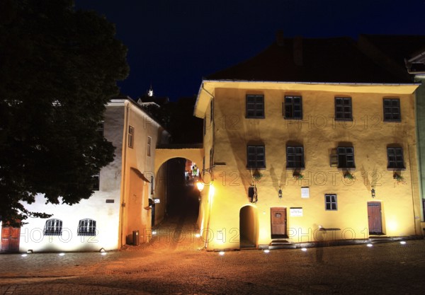 Romania, Vlad Tepes' birthplace at blue hour in the historic old town of Sighisoara, German Sighisoara, town in Mures district in Transylvania, UNESCO World Heritage Site