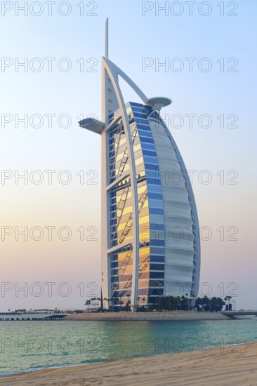 Dubai, United Arab Emirates. July 1st 2019 Evening scenic view of Burj Al Arab, landmark iconic luxury hotel on Jumeirah beach, beautiful Dubai, United Arab Emirates, Middle East