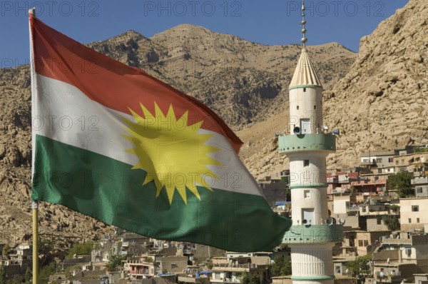 Akre, Kurdish North Iraq. October 2nd 2009 Kurdish flag flying over the village of Akre, near Dohuk in the Kurdish north of Iraq
