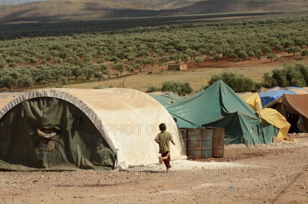 Atmeh Refugee Camp, Idlib, Syria. June 19th 2013. Internally displaced child Syrian refugees in the Atmeh refugee camp, Idlib province Syria