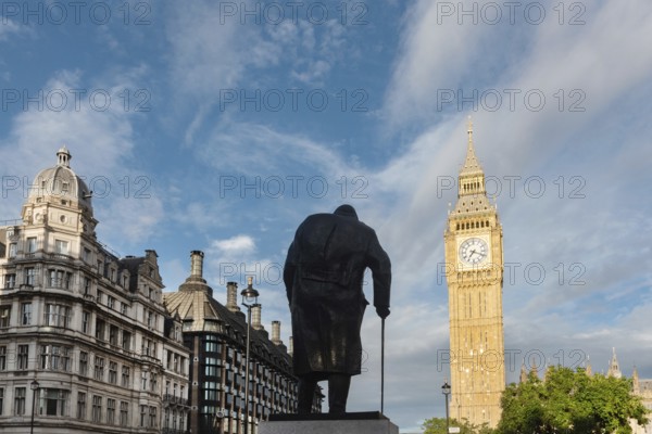 London, United Kingdom. August 2nd 2023 Iconic Big Ben with a statue of Sir Winston Churchill the former British Prime Minister near the House of Parliament in Westminster, London, UK