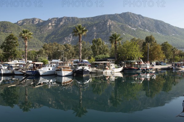 Akyaka, Mugla, Turkey. September 8th 2022 Boats moored in the beautiful harbour of Turkish Riviera seaside town of Akyaka on the south west coast of Turkey