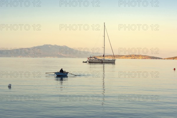Bodrum, Mugla, Turkey. April 21st 2022 A fisherman at dawn in the beautiful harbour of Bodrum on the Turkish southwest coast of the Aegean sea, Turkey