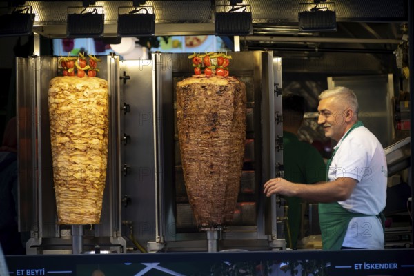 Istanbul, Turkey 10th November 2022 Turkish Kebab meat cooking on large skewers in a take away sandwich shop in Istiklal Street, Istanbul, Tukey