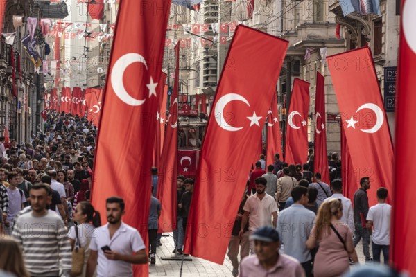 Istanbul, Turkey. October 29th 2023 Crowds flock between the many flags in Istiklal Street, Istanbul, to celebrate the 100th anniversary of the founding of the modern state of Turkey