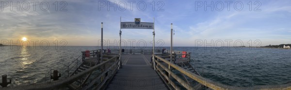 Sunset, pier, Heiligendamm is the oldest seaside resort in Germany and continental Europe, founded in 1793 by Frederick Francis I, Duke of Mecklenburg-Schwerin, hotels, spa architecture, Baltic Sea coast, panorama, Mecklenburg-Western Pomerania, Germany
