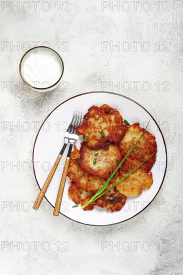 Potato pancakes, pancakes with sour cream, Belarusian dish, homemade, no people