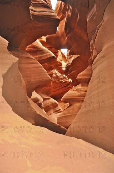 Warm lit sandstone with wonderful forms of natural erosions on a sunny day, Antelope Canyon, Navajo Nation Reservation, Lake Powell Tribal Park, Arizona, USA