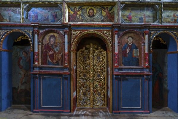 Gilded door in the 16th century Gothic wooden church of St. Paraskevi, Radruz, Poland