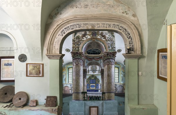 Entrance gate and view of the secular synagogue in Lancut formerly Landshut, Poland