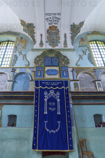 A parochet, curtain in front of the Torah shrine in the interior of the secular synagogue in Lancut formerly Landshut, Poland