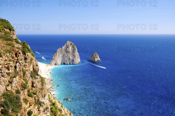 The Mizithres are two spectacular rock formations rising majestically from the azure Ionian Sea off the western coast of Zakynthos. Located near the picturesque village of Keri