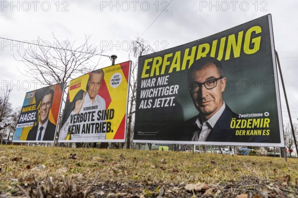 Election advertising for the 2026 state election in Baden-Württemberg. Large posters of the Green Party, CDU and FDP. Top candidates Manuel Hagel and Cem Özdemir. Fellbach, Baden-Württemberg, Germany