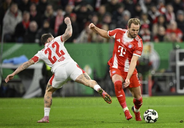 Duel, action Harry Kane FC Bayern Munich FCB (09) against David Raum RasenBallsport RB Leipzig RBL (22) Football Bundesliga, DFB Cup, Allianz Arena, Munich, Bavaria, Germany