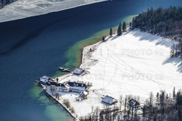View from above of the snow-covered pilgrimage church of St. Bartholomä am Königssee, Berchtesgaden National Park, Schönau am Königssee, Berchtesgadener Land, Upper Bavaria, Germany