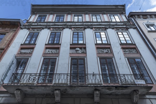 Four seasons house with twelve zodiac signs, the four seasons and Chronos reliefs, Lviv, Ukraine