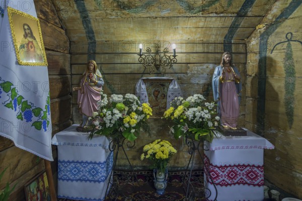 Marian Altarpiece in the historic wooden Trinity Church, Zhovkva city, Ukraine