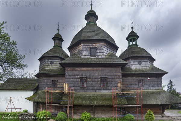 Historic wooden Trinity Church in Zhovkva city, Ukraine