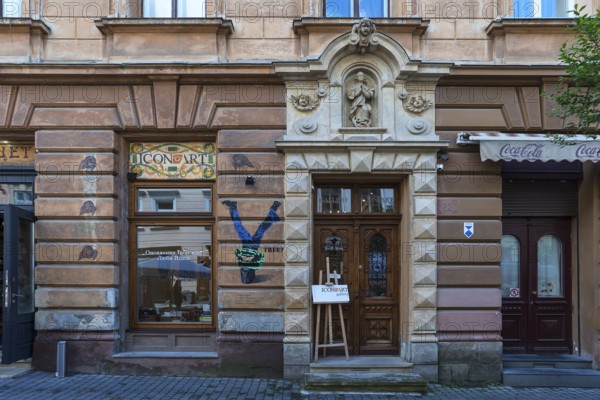 House entrance with figure of saint, 19th century, Lemberg, Ukraine
