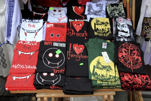 Souvenir sale at Bran Castle, marketing of Dracula, printed here on shirts, Törzburg, in Transylvania, Romania. It is famous as Dracula's Castle and one of the country's main attractions