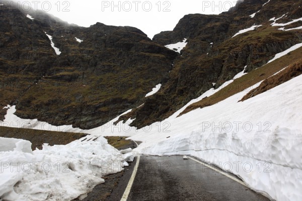 Transfogarasan High Road, Transfagarasan, connects the Arges Valley in Great Wallachia with the Olt Valley in Transylvania, crossing the Fagaras Mountains in the Transylvania Alps, blocked by snow in May and blocked, Romania