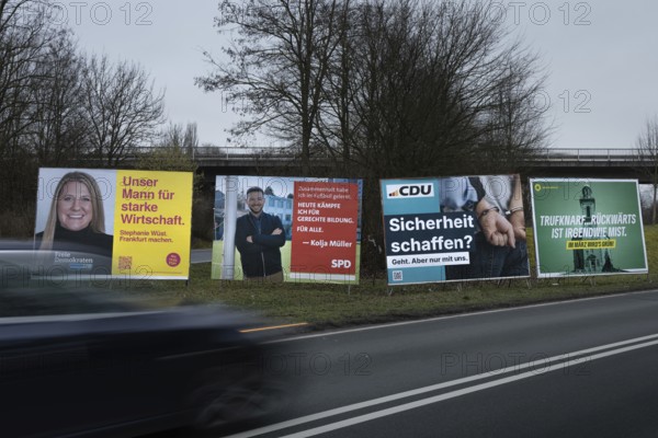 Large election posters are standing on a street in the northwest of Frankfurt. The Hessian state government has set March 15, 2026 as the election day for the local elections in Hesse. On this day, the elections of the City Council and the 16 local advisory councils will take place in Frankfurt am Main, Germany
